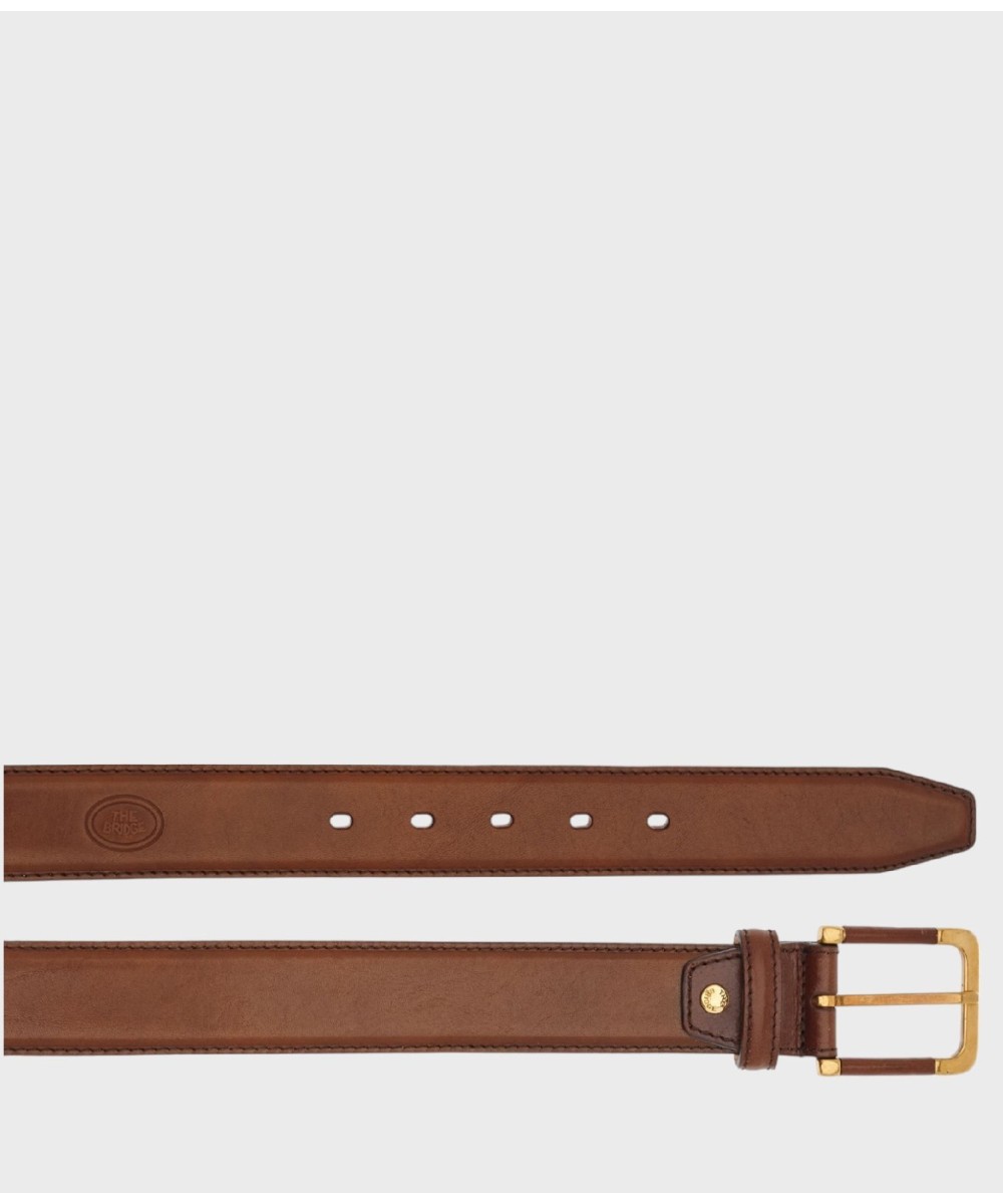 The Bridge Story belt with brass and leather...