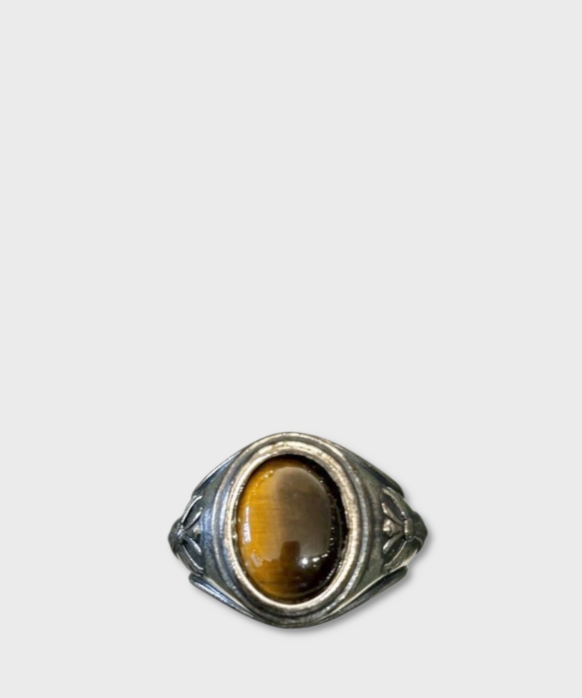Left-handed silver ring with oval brown agate,...